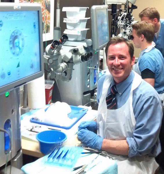 Photo of three residents working in the CORO lab.