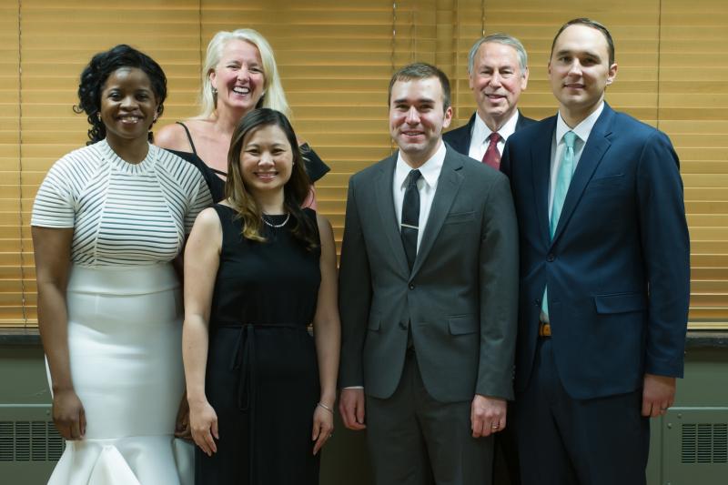 Residency Program Coordinator (Jayne Ward, back row left) & Chair (David Kaufman, back row right) with 2018 Resident Graduates (front row in order starting left: Hollist, O'Young-Olliver, Bracken, Long)